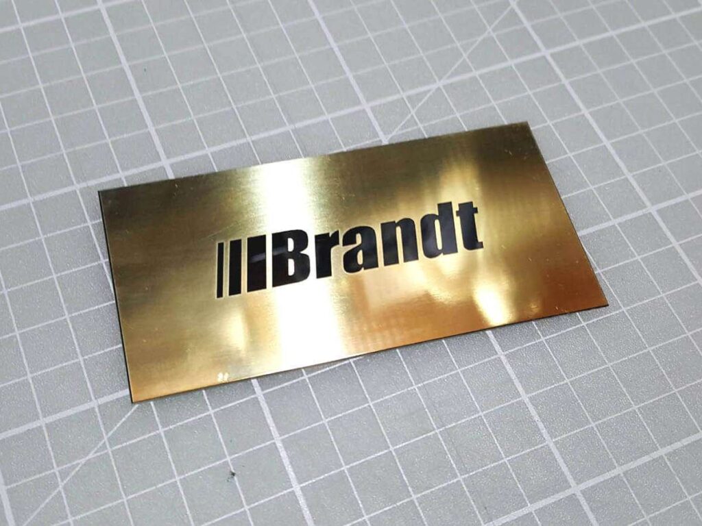 Laser marked brass plate for Brandt
